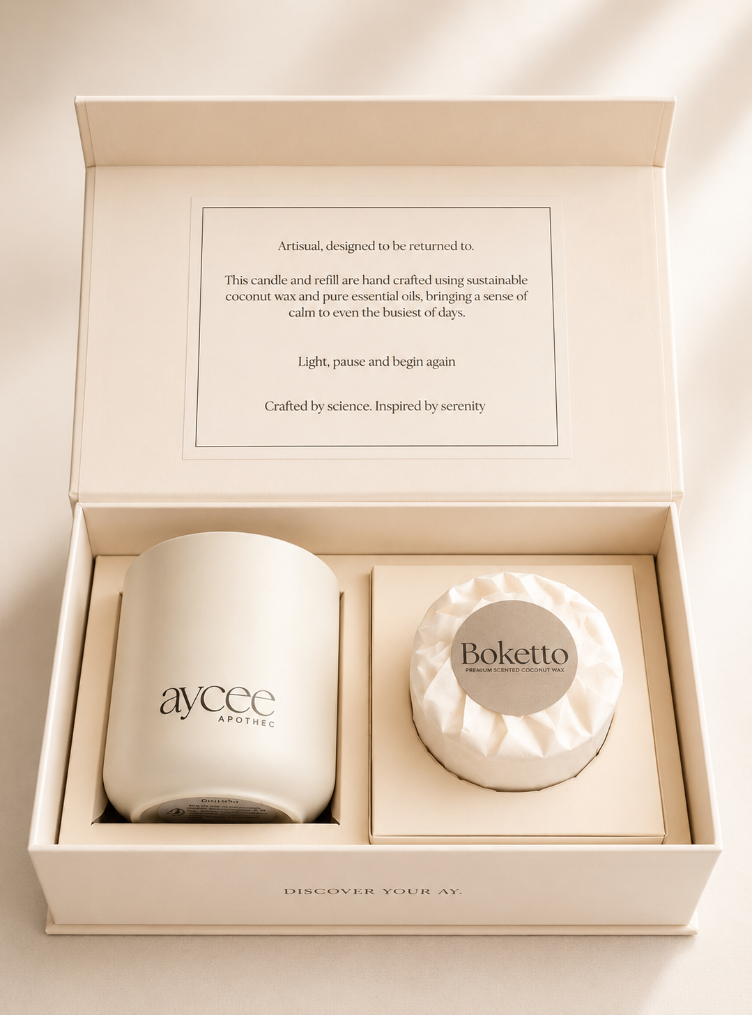 Candle and refill set in a branded box with Aycee Apothec and Boketto labels.